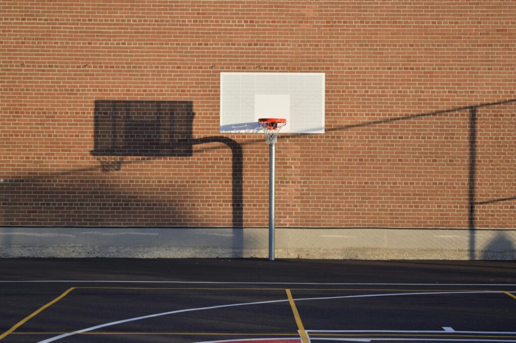 A basketball court at sunset