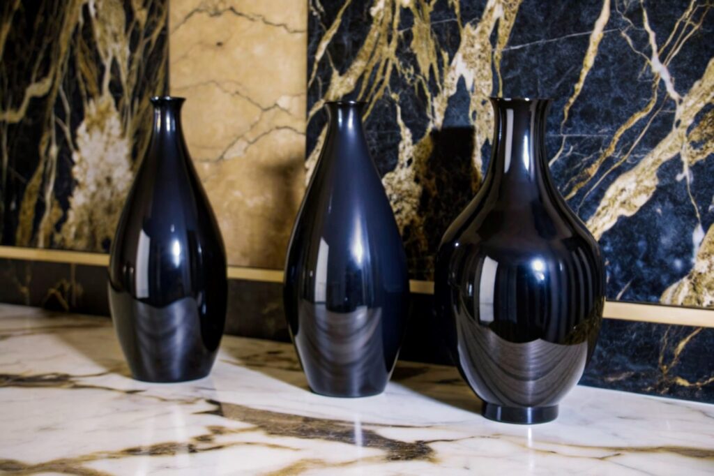 Big dark blue vases on a marble floor